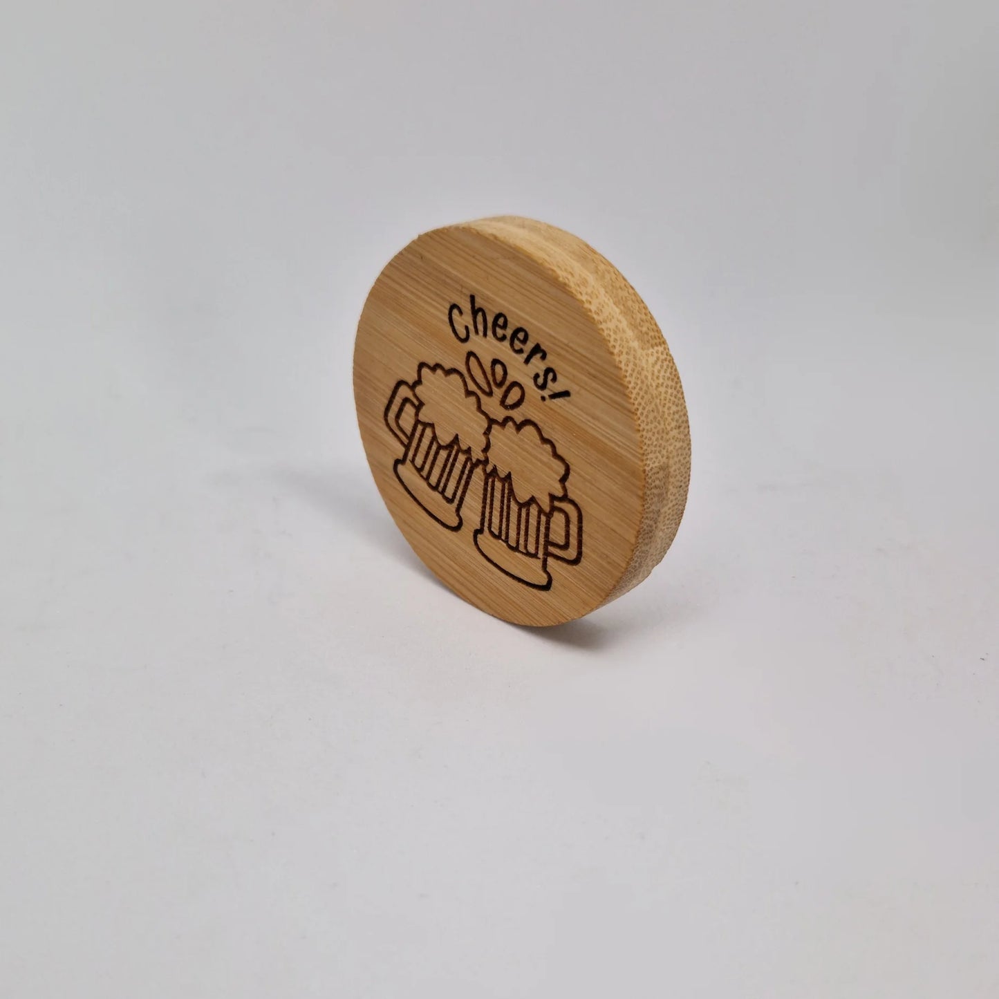 A side view of the bamboo wooden bottle opener, highlighting its smooth, rounded edges and natural wood grain. The thickness of the opener is visible, showing its sturdy, solid build.