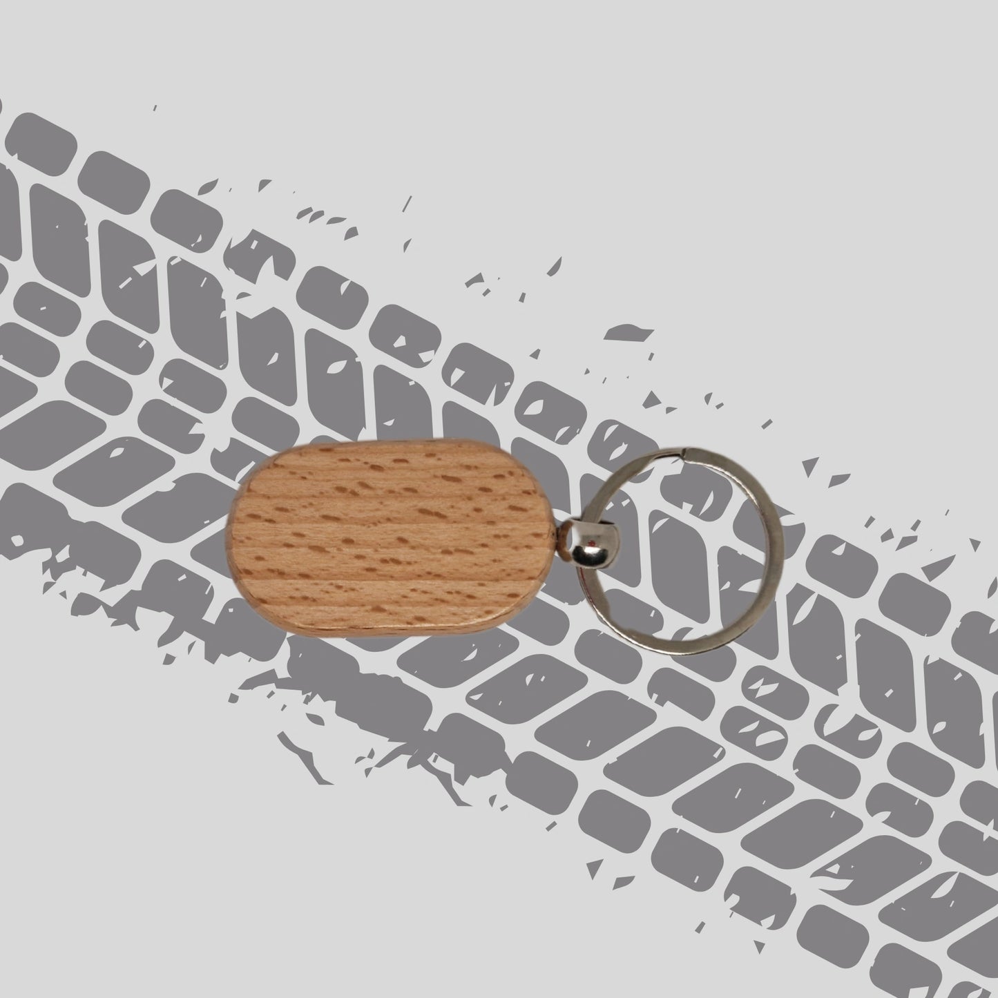 The back of one wooden F1 driver abbreviation and number keychain, showing the smooth, natural wood grain. The surface is clean, with no engraving or markings.