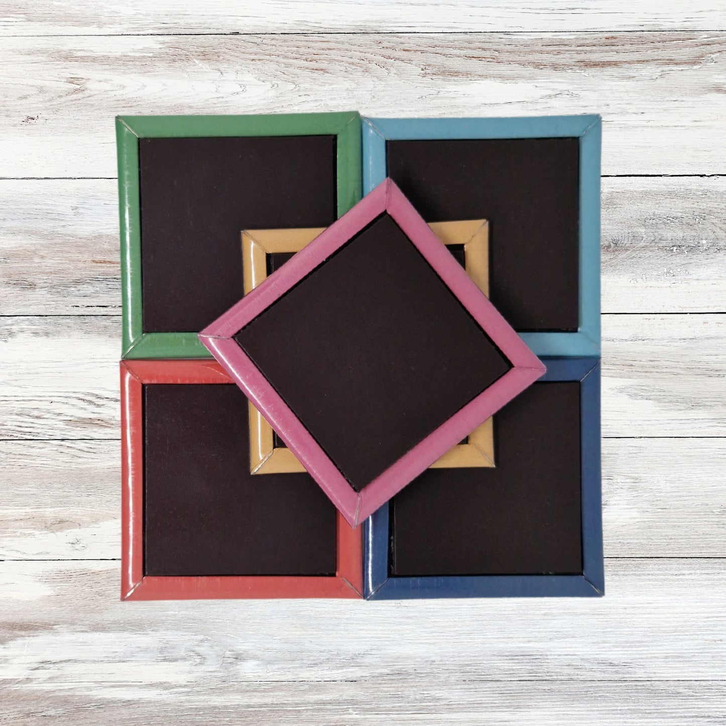 Rear view of a set of six Ted Lasso-inspired fridge magnets, showing the strong black magnetic backing. The magnets cover most of the reverse side, ensuring a secure hold on any fridge or metal surface.